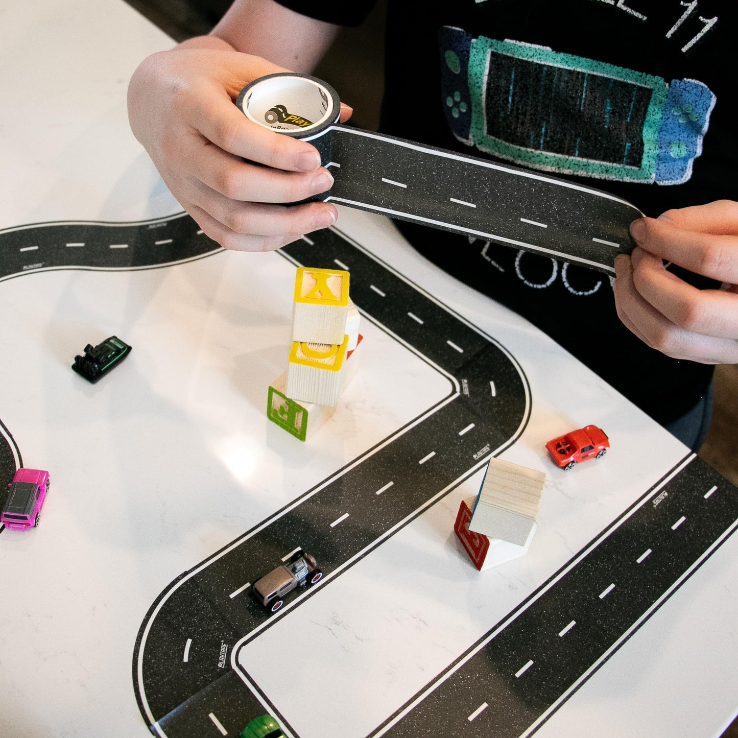 PlayTape Road Tape for Toy Cars - Sticks to Flat Surfaces, No Residue; 2 inch Wide x 30 ft Asphalt Road