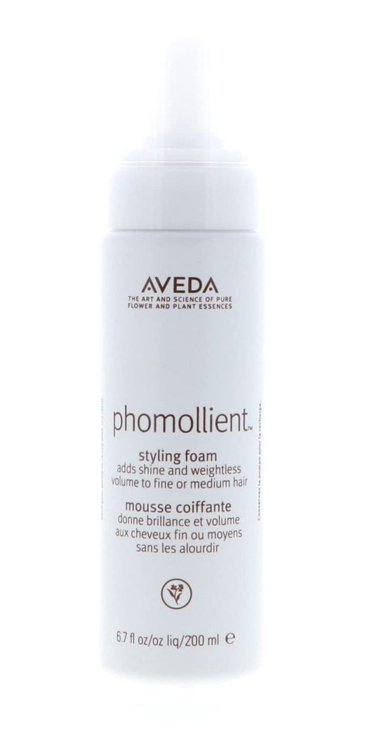 Aveda phomollient styling foam bottle on a white background