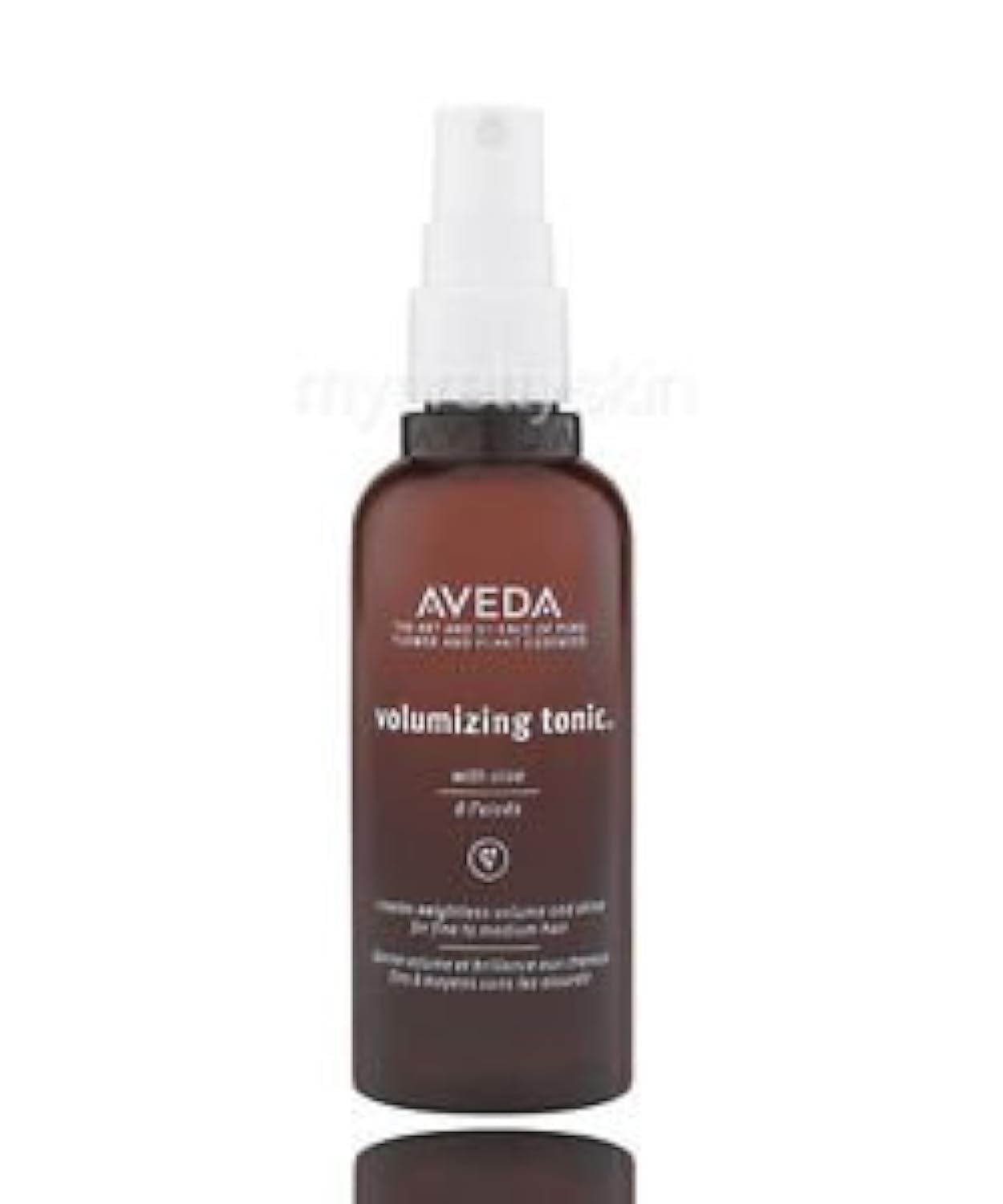 Aveda volumizing tonic bottle on a white background