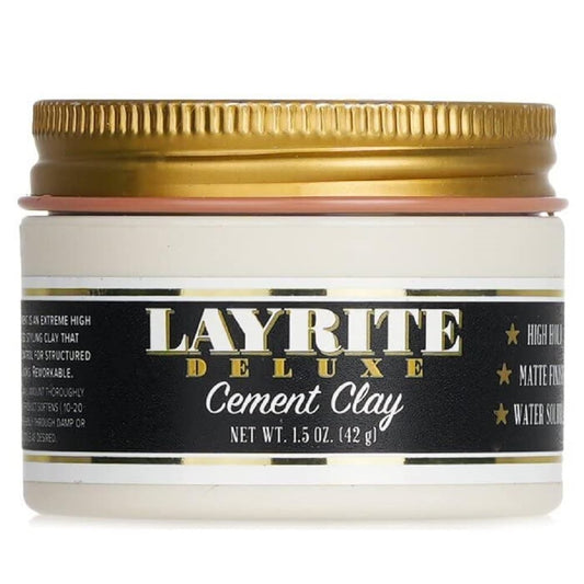 Jar of Layrite Deluxe Cement Clay with gold lid on a white background