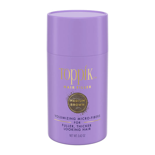 Purple container of Toppik hair filler on a white background