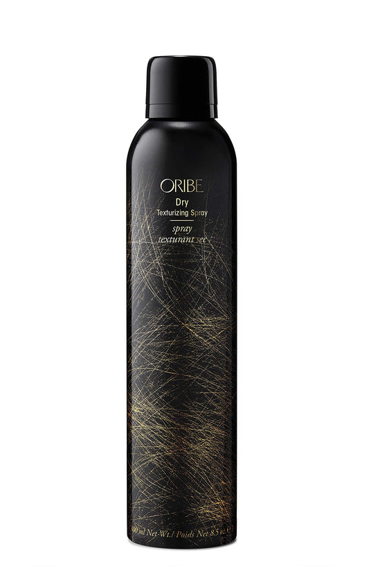 Oribe dry texturizing spray bottle on a white background