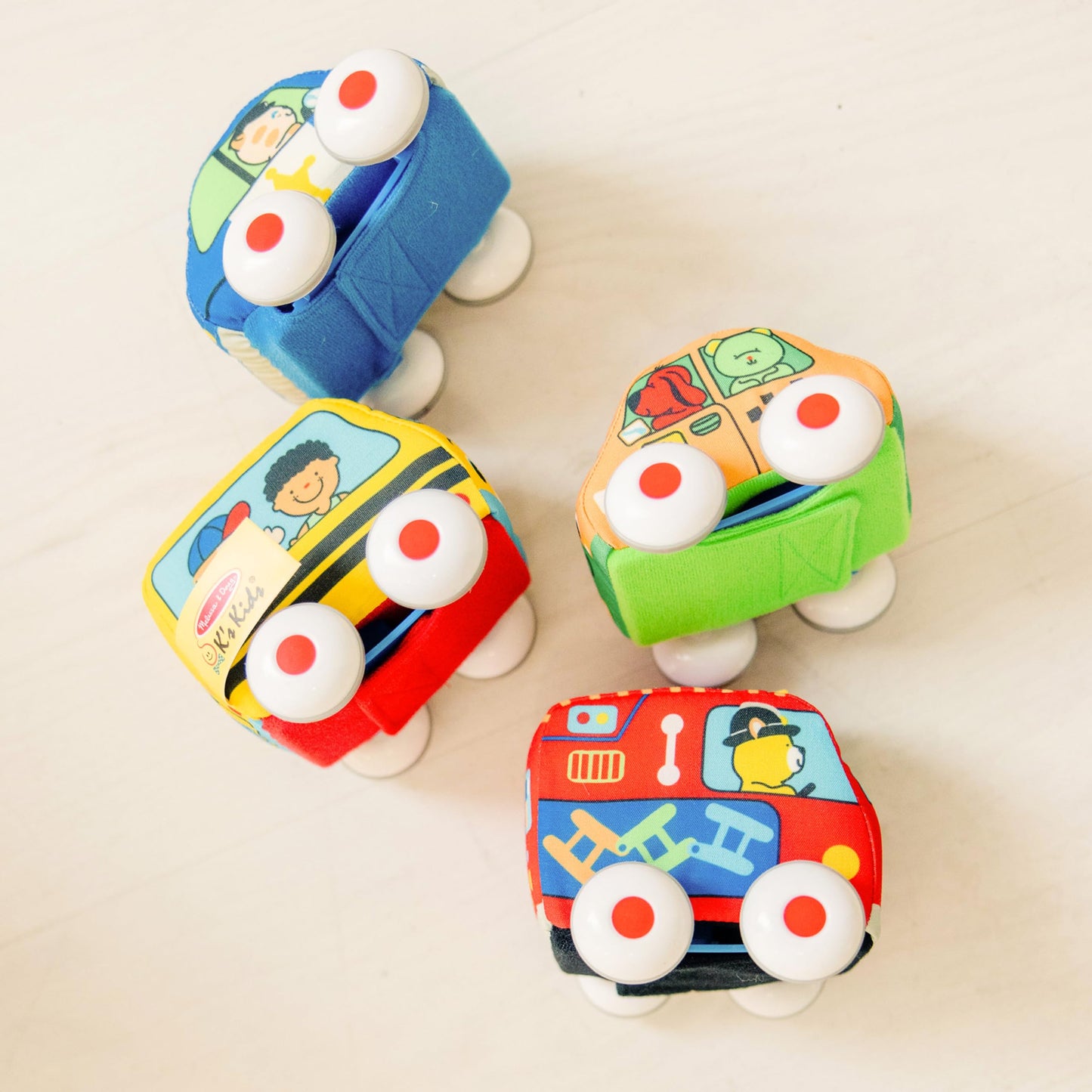 Melissa & Doug K's Kids Pull-Back Town Vehicle Set - Baby Toys Set with 4 Soft Toy Cars and Trucks, Surface Washable with Removable Wheels, Learning Toys for Babies and Toddlers